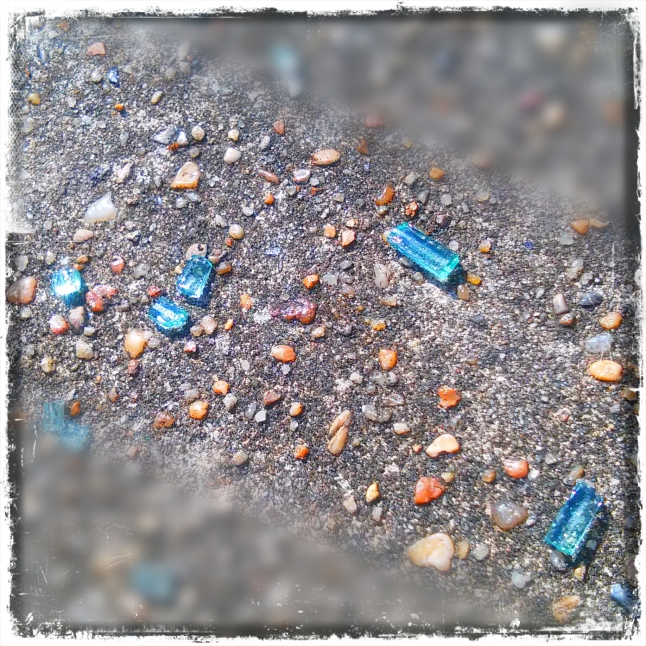 I snapped this shot of glass shards while we were walking the perimeter of St. Louis Cemetary 1. I used Pixlr Express to edit the shot. I did a lot more with this one than the rose photo. 